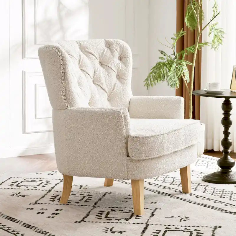 Clubsessel Almond Boucle mit Nagelbesatz