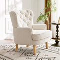 Clubsessel Almond Boucle mit Nagelbesatz